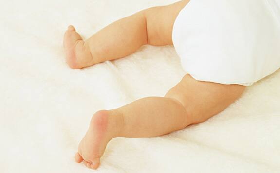 Image of a baby with a diaper