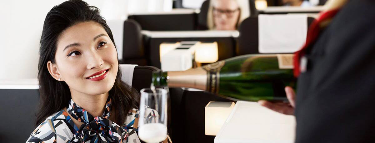 women being served wine